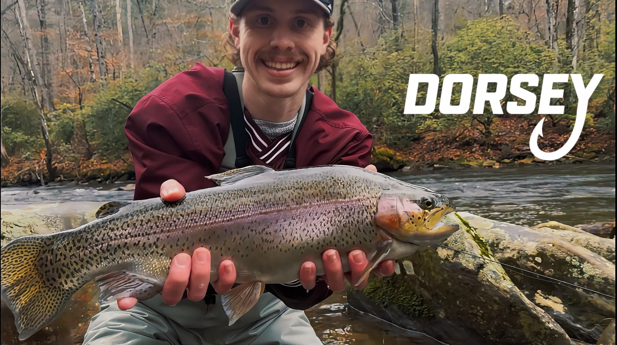 Dorsey Fishing guide holding a trout in Western North Carolina